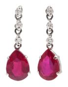 Pair of platinum ruby and diamond pendant earrings