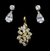 Gold cublic zirconia pendant and a pair of gold cubic zirconia pendant stud earrings