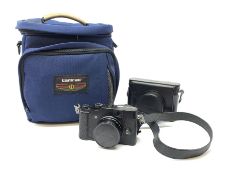 Fuji film X10 digital camera with leather case