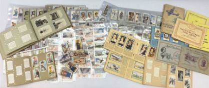 A collection of cigarette cards