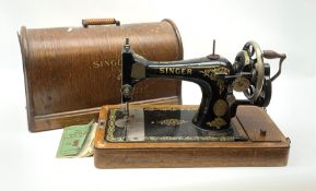 A cased Singer sewing machine