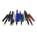 A group of fountain pens