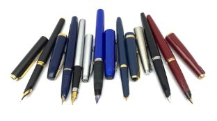 A group of fountain pens