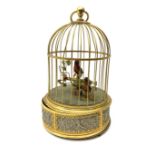 A mid 20th century automaton of two birds within a cage