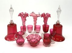 Three Victorian cranberry glass trumpet vases
