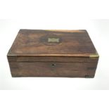 A 19th century rosewood writing slope (lacking interior)