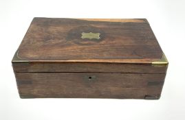 A 19th century rosewood writing slope (lacking interior)