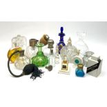 A collection of early 20th century glass atomizers and scent bottles