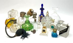 A collection of early 20th century glass atomizers and scent bottles