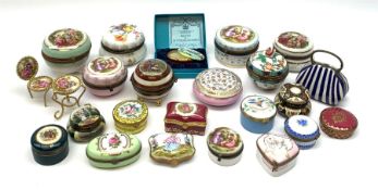 A group of various pill and trinket boxes
