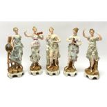 A group of five Continental figurines modelled as the arts