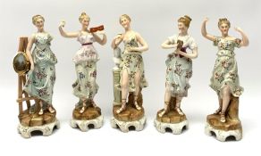 A group of five Continental figurines modelled as the arts