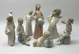 A group of six Lladro figures