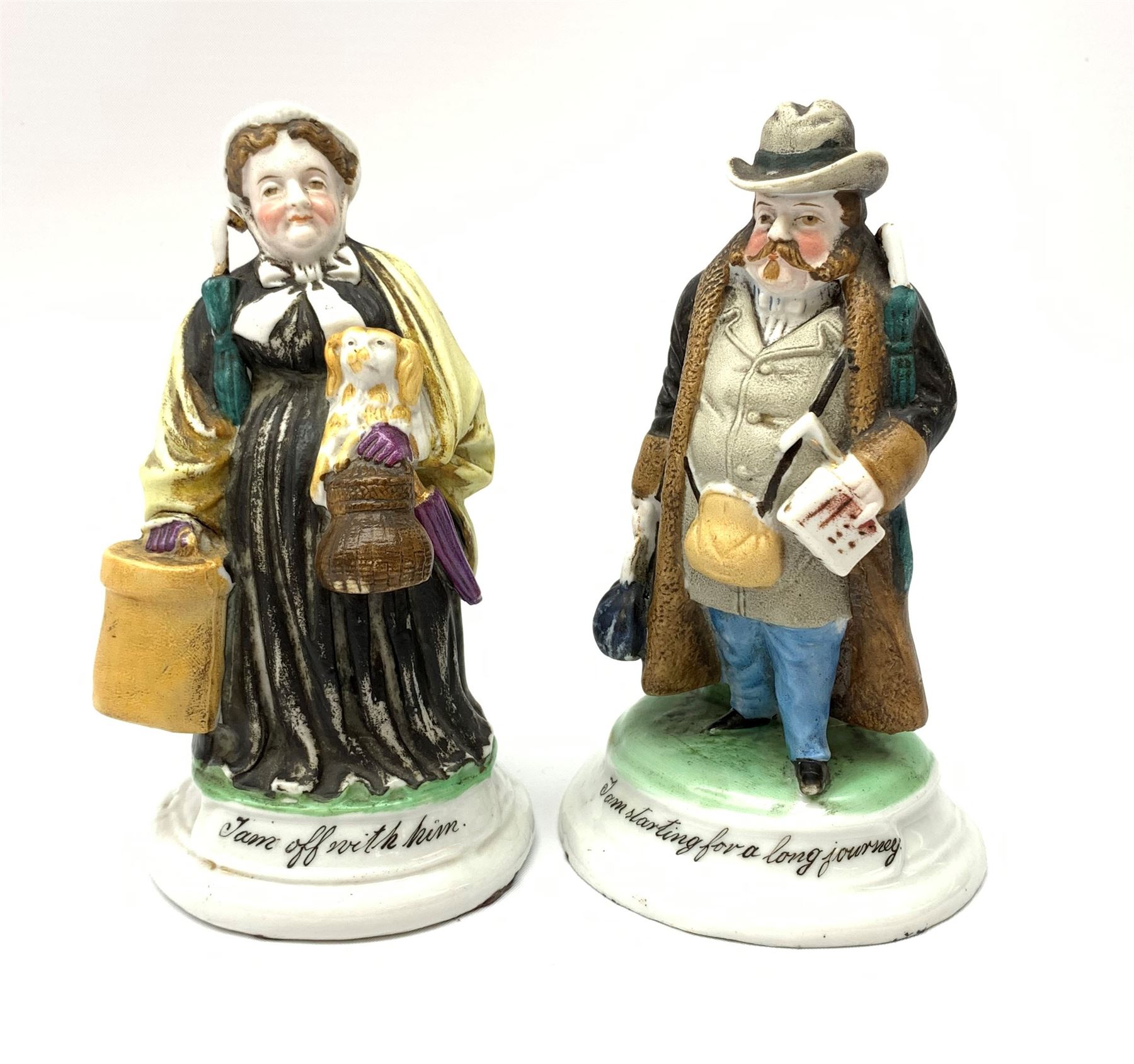 A pair of Victorian figural table vesta and match strikers