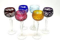 A set of five harlequin overlaid and cut hock glasses