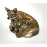 A Royal Copenhagen figure group modelled as a fox with cubs