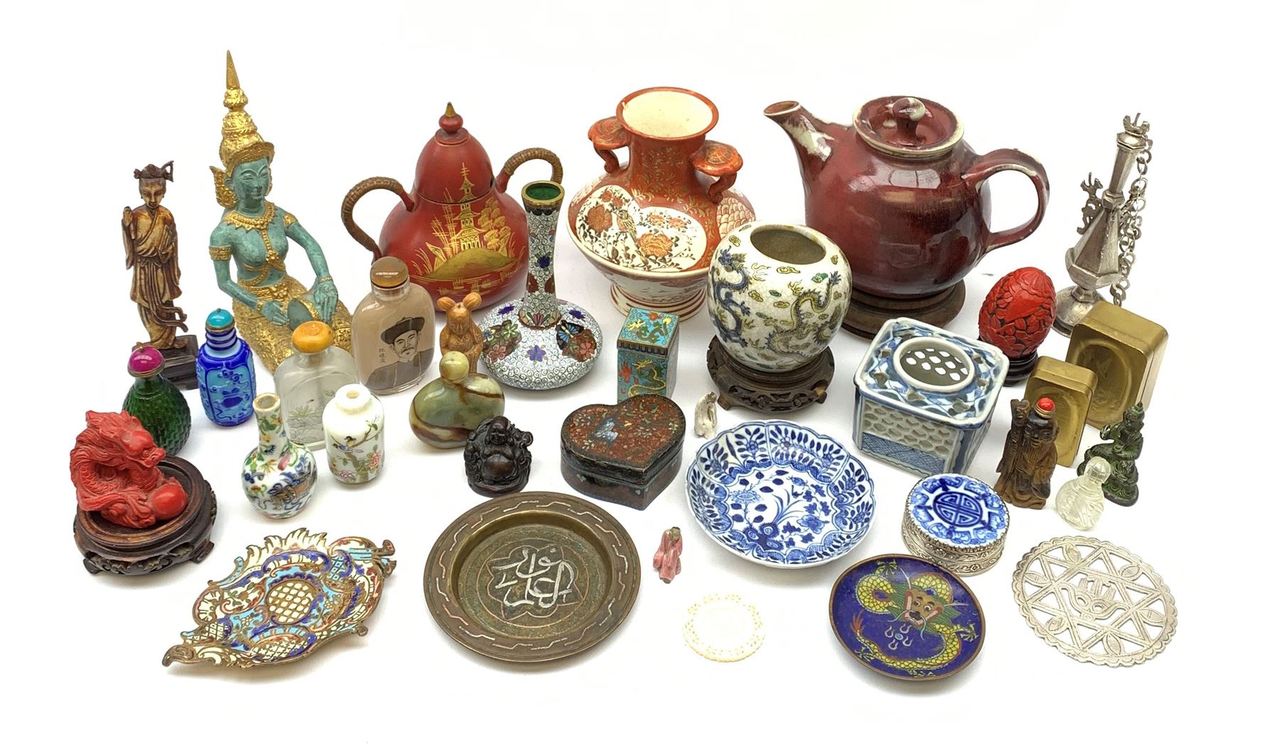 A group of assorted Eastern collectables
