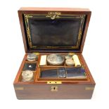 A 19th century mahogany brass bound vanity box