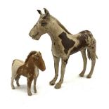 Two Edith Reynolds hand-made and rubber filled real skin horses