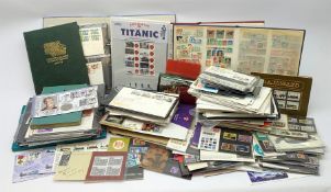 Great British and World stamps in seven albums/folders and loose including FDCs