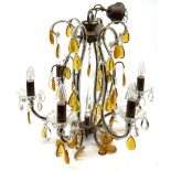 A Murano style chandelier, with six curved branches with frilled clear glass drip pans hung with cle