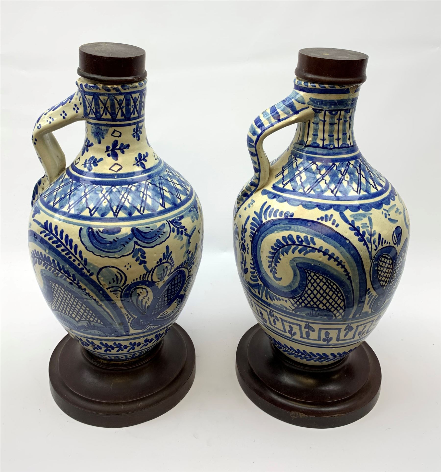 A pair of 20th century blue and white delft water jugs - Image 2 of 4