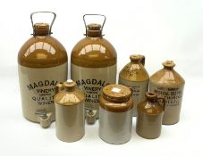 A group of stoneware bottles