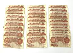 Thirty-one Bank of England O'Brien ten shilling banknotes