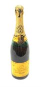 One bottle of Veuve Clicquot Ponsardin 1947 dry champagne, foil seal partially damaged, level below