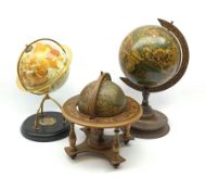 Three small desk globes