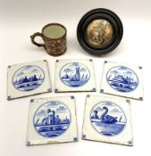 Five 19th century blue and white Delft tiles