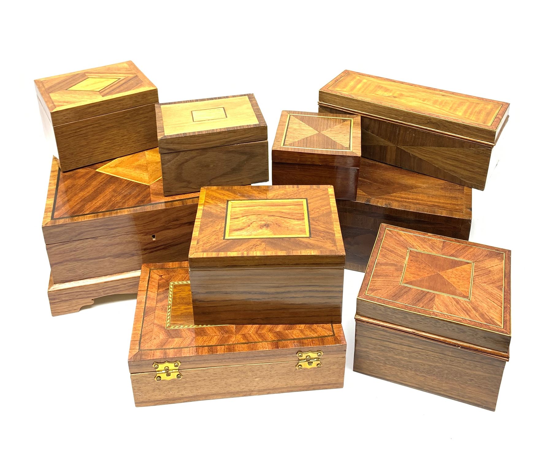 A group of modern veneered boxes