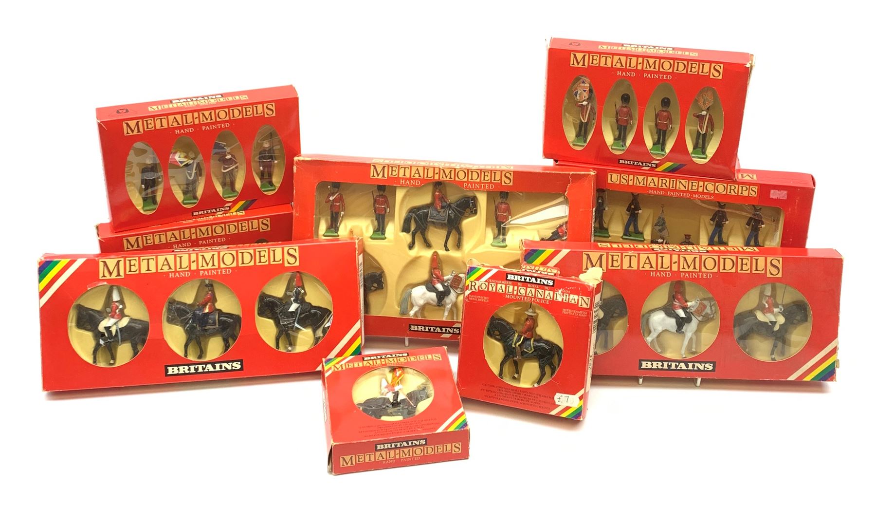 Britains 'Metal-Models' series - nine sets/mounted soldiers comprising 7218 H.M. Queen Elizabeth set