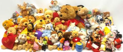 Over fifty Walt Disney character soft toys including various Pooh bears