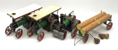 Two Mamod TE1A traction engines with steering rods; Mamod SR1 steam roller with steering rod; and Ma