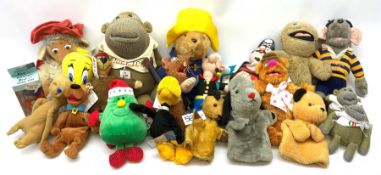 Twenty-one TV and film related and promotional soft toys including Sooty and Sweep hand puppets