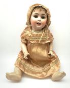 German bisque head doll with applied hair