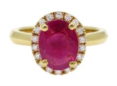 18ct gold oval ruby and diamond cluster ring