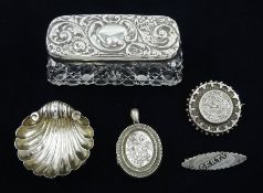 Victorian silver locket and circular brooch and an Edwardian silver brooch