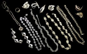 Collection of silver jewellery including matching bracelet and necklace sets
