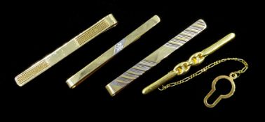 Four 9ct gold tie clips