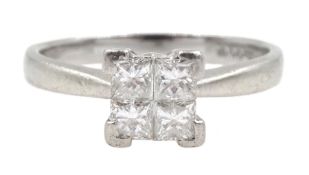Platinum four stone princess cut diamond ring