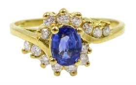 18ct gold oval sapphire ring with round brilliant cut diamond crossover shoulders