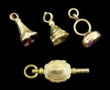 Three Victorian gold mounted seal fobs and a gold mounted watch key (4)