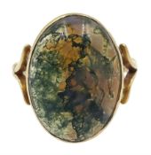 Early 20th century gold cabochon moss agate ring
