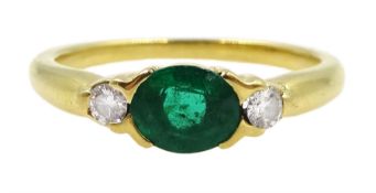 18ct gold oval emerald and diamond three stone ring