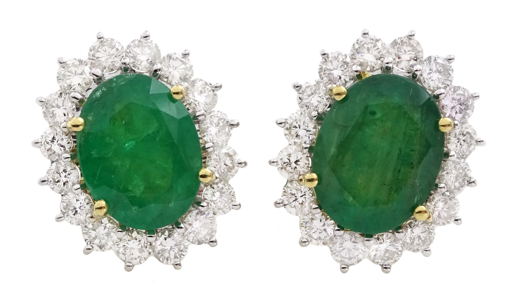 Pair of 18ct gold oval emerald and round brilliant cut diamond cluster stud earrings