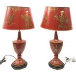 A pair of 21st century red toleware style table lamps with shades