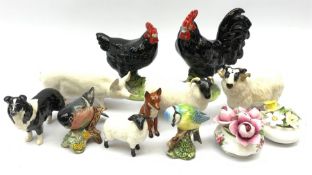Eight Beswick animals comprising a seated Fox