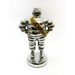 'Michelin Man' chrome plated figure